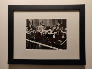 Harpo marx playing trombone  framed